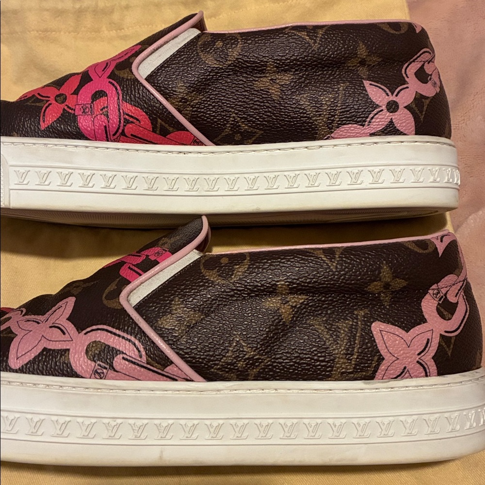 Louis Vuitton logo sneakers.